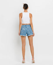 Load image into Gallery viewer, Back view of the lady wearing the High Rise Block Shorts.