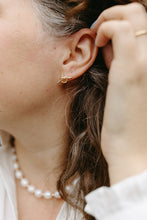 Load image into Gallery viewer, Owner of Cedar and Cypress Designs wearing the All Tied Up Earrings.