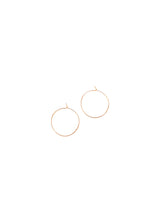 Load image into Gallery viewer, Dainty Gold Hoop. With their waterproof feature, you can confidently wear them in any weather or activity.
