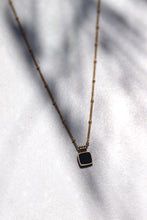 Load image into Gallery viewer, This dainty necklace has a black pendant accent and is water proof! 16" with; 2" extender.