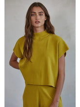 Load image into Gallery viewer, The Chartreuse Top is made from knit fabric, this sleeveless top features a ribbed mock neck, providing a chic and modern look.
