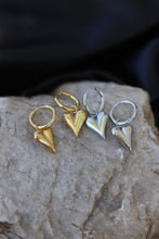 Load image into Gallery viewer, Gold Heart Huggy Earrings are made of durable stainless steel and are water-proof. Now available in silver too!
