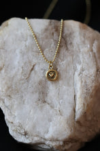 Load image into Gallery viewer, CN-117DaintyHeartCharmNecklaceonarock1
